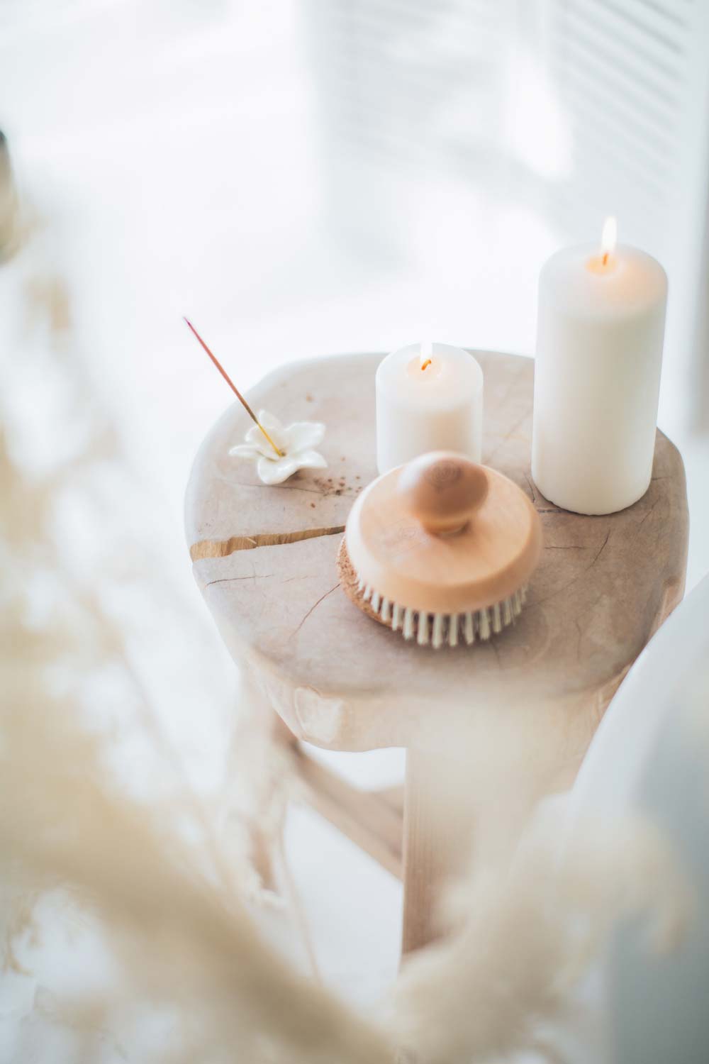 incense-and-white-candles-on-a-stool-3865712